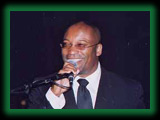 Filmmaker John Singleton addresses fellow USC alumni and guests